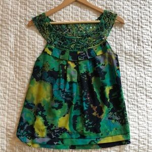 Green and blue printed blouse w/ lattice neckline